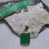Dije masculino en oro de 18k (2.61 gramos) con esmeralda 0 USD.