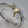 Pulsera Tortuga en Plata S925 con Nácar Blanco y Detalles en Oro 18k – Kovel  Usd.