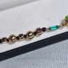 WhatsApp Image 2026-03-03 at 1.49.51 AM (1) Pulsera Peridoto esmeraldas y Rubis