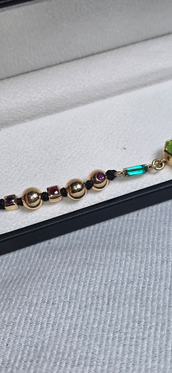 WhatsApp Image 2026-03-03 at 1.49.51 AM (1) Pulsera Peridoto esmeraldas y Rubis