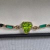 WhatsApp Image 2026-03-03 at 1.49.58 AM (1) Pulsera Peridoto esmeraldas y Rubis