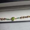 WhatsApp Image 2026-03-03 at 1.49.59 AM Pulsera Peridoto esmeraldas y Rubis