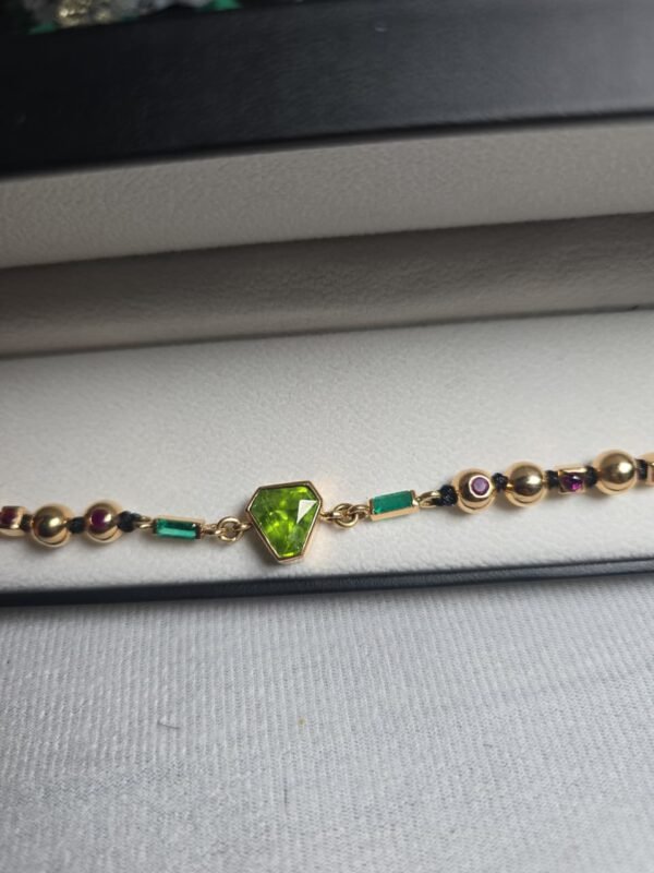 WhatsApp Image 2026-03-03 at 1.49.59 AM Pulsera Peridoto esmeraldas y Rubis